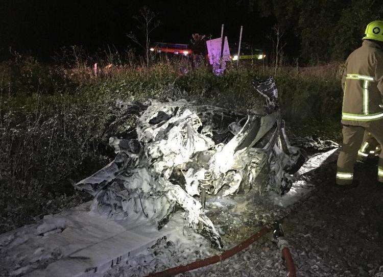 The car burst into flames after it was hit by the train (5023391)