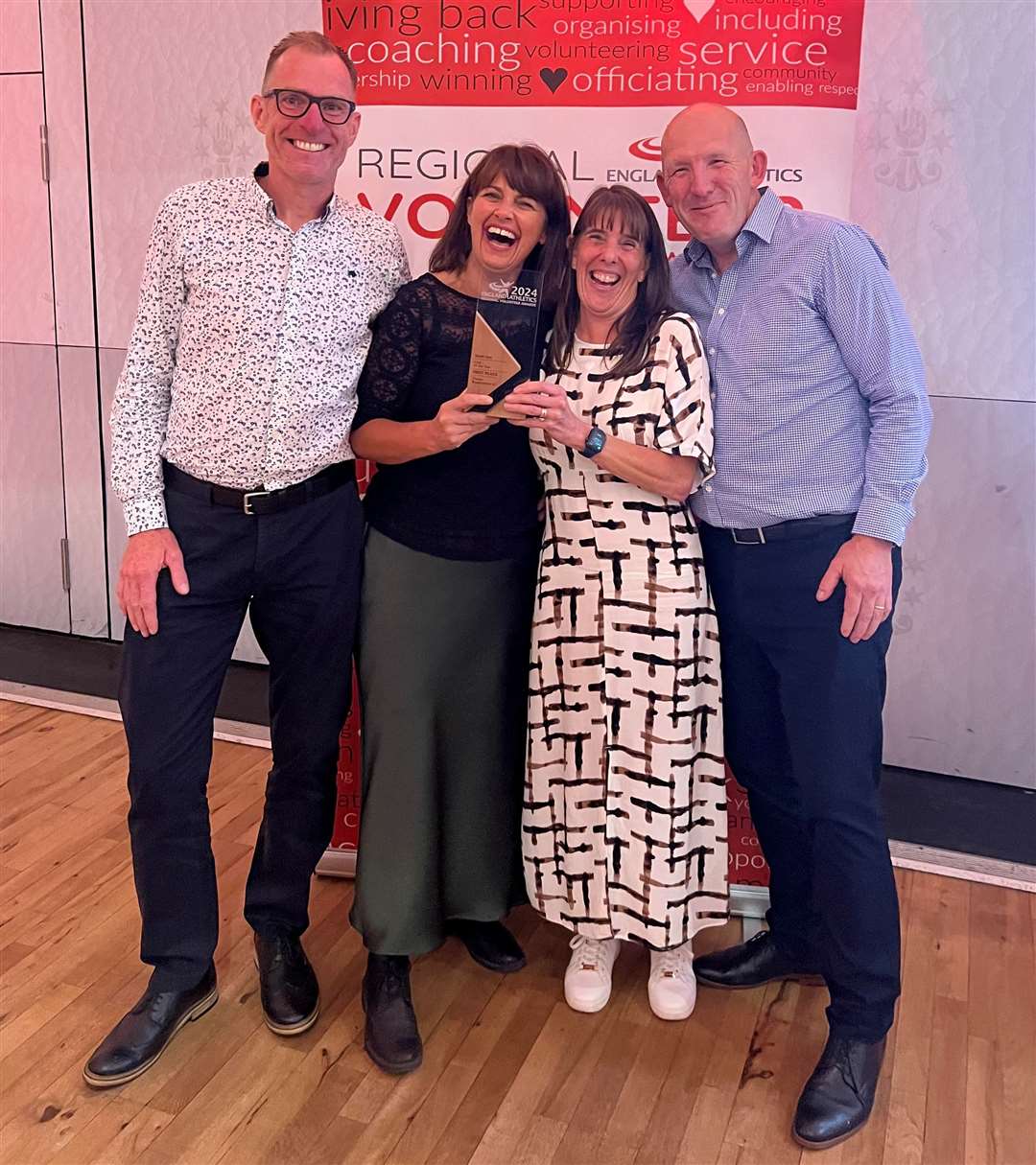 From left, Thanet Roadrunners' welfare lead Ade Neaves, club chair Julie Neaves, membership secretary Jo Holl and publicity manager Jon Holl are all smiles after their regional accolade. Picture: Jon Holl