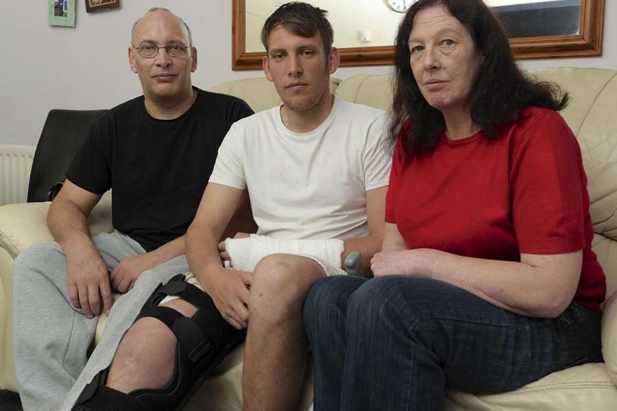 Ricky Knowles at home in Strood with father Gary and mother Chris