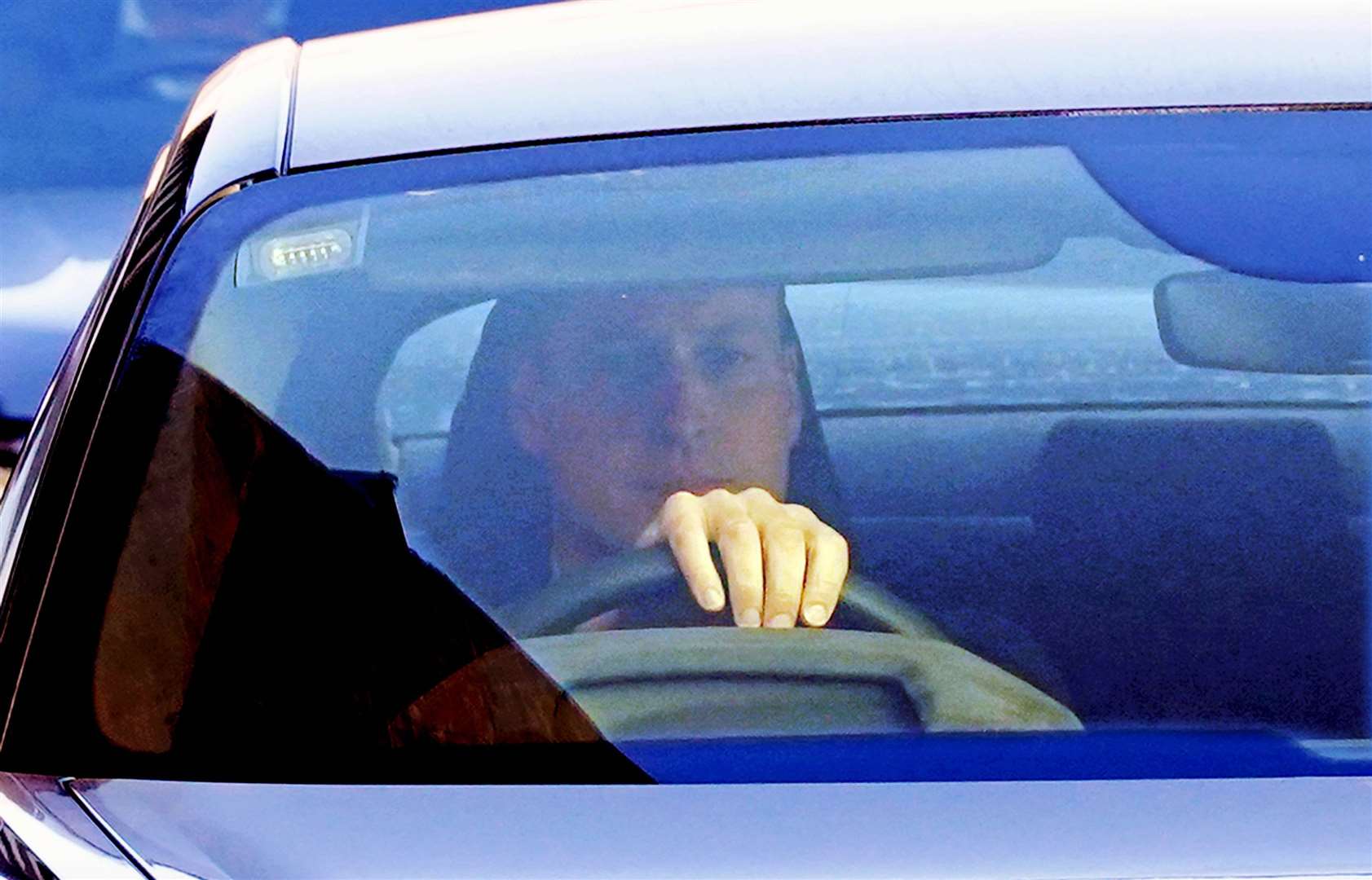 William drives away from The London Clinic (Lucy North/PA)