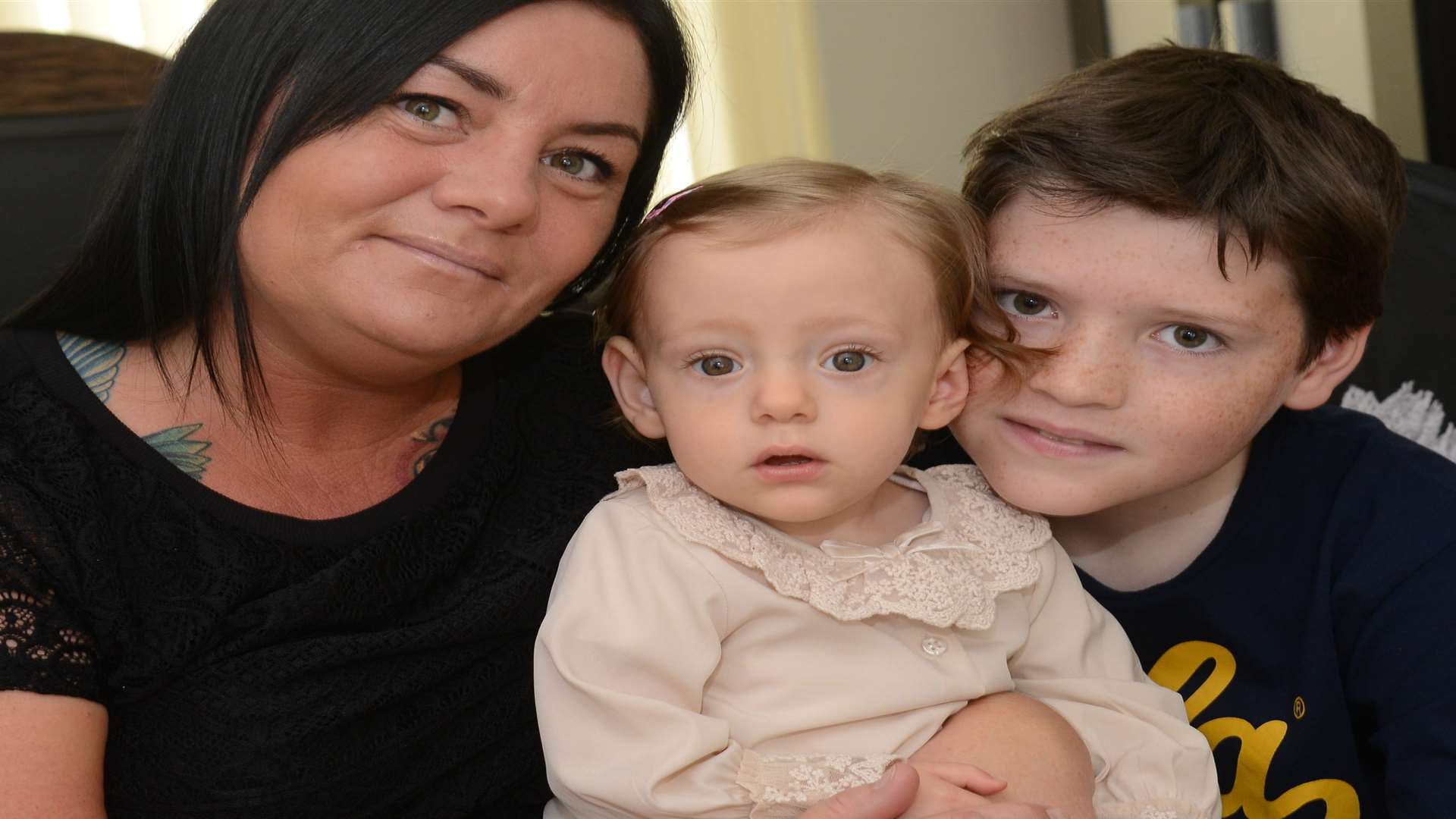 Nicole Freeman with her daughter Grace, one, and son Finlay, 11