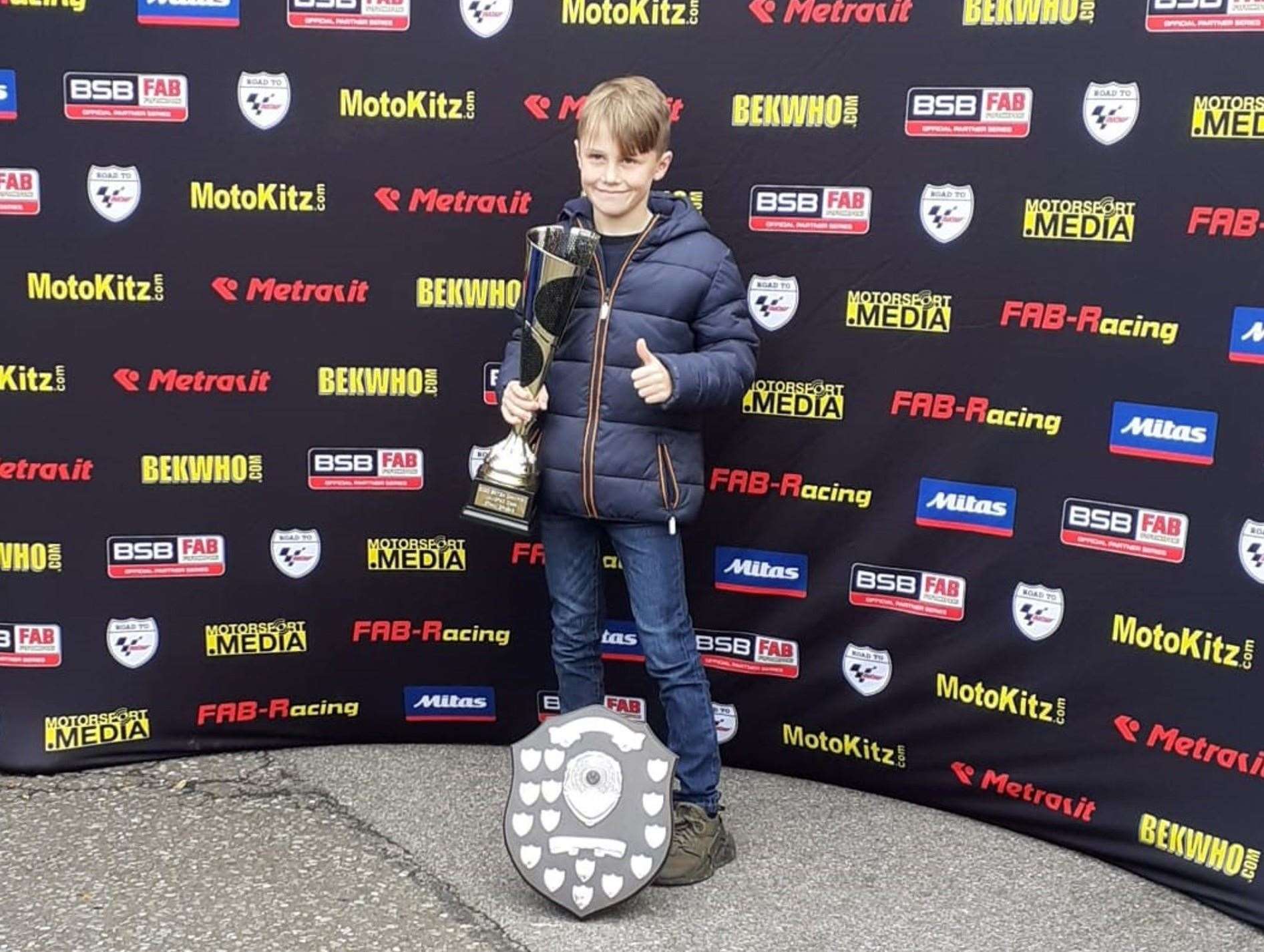 Ethan Sparks with his trophies at Brands Hatch