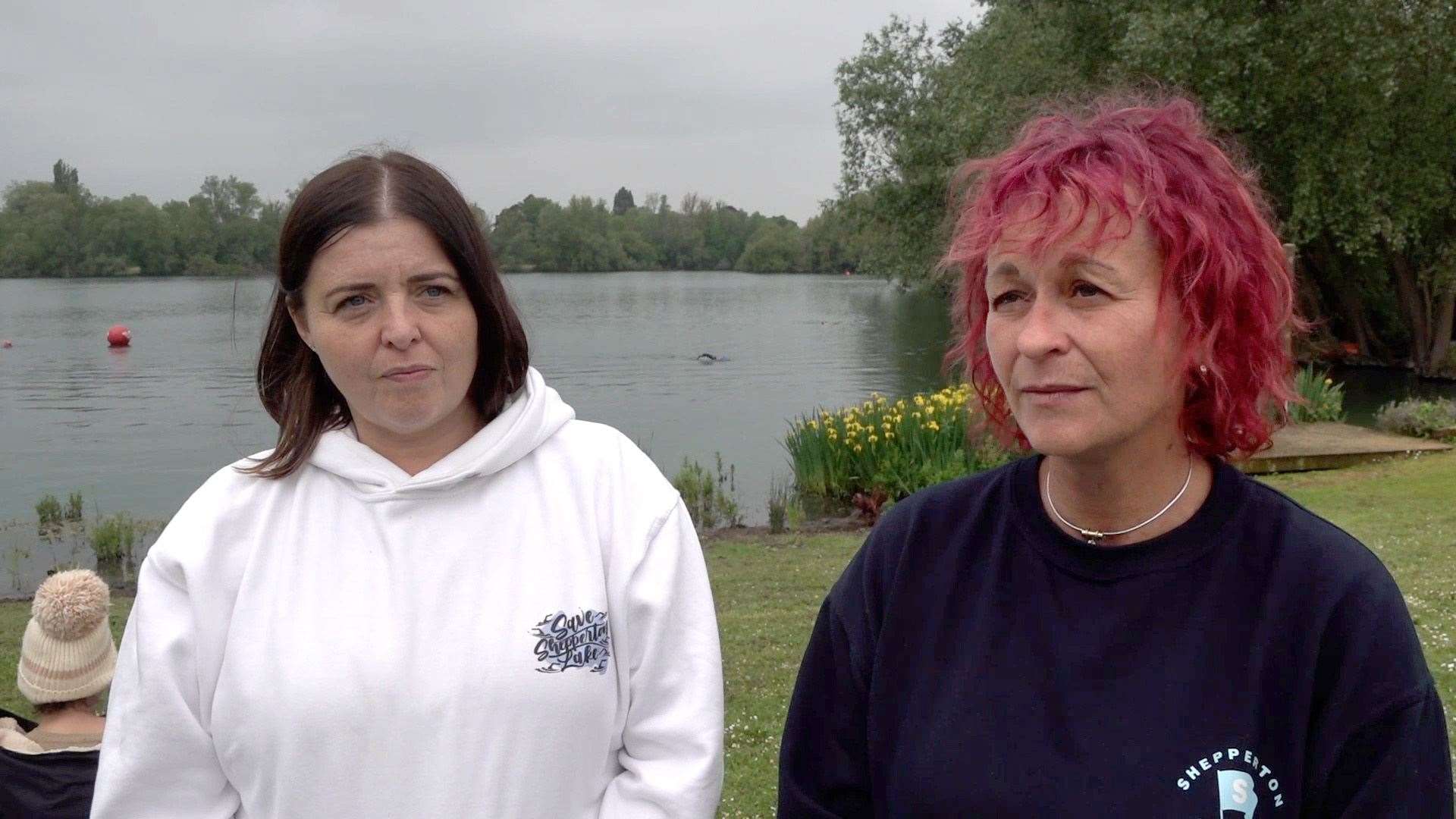 Emma Jackson (left) and Emma Pattinson at Ferris Meadow Lake in Surrey (Elena Giuliano/PA)