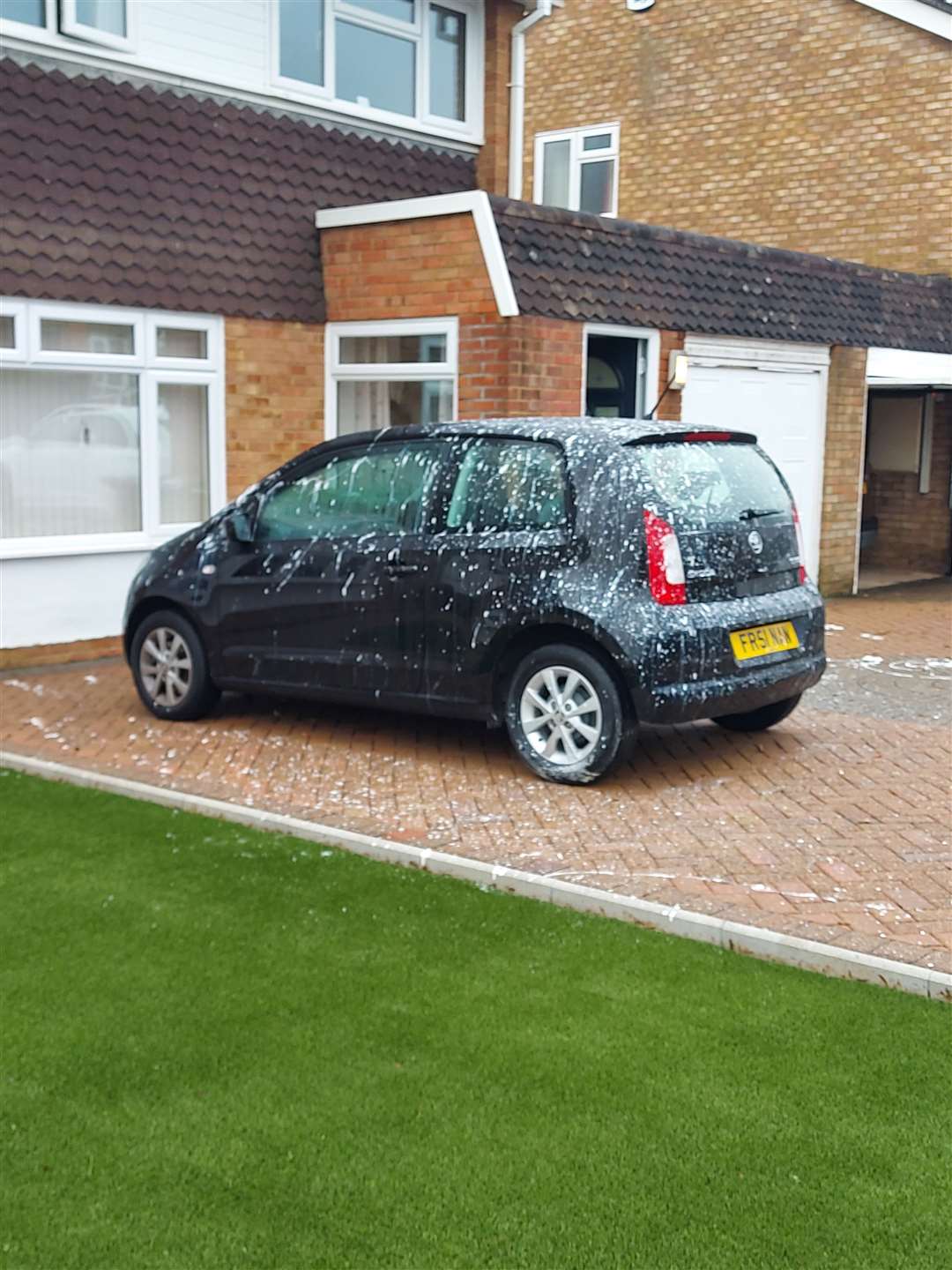 A paint-damaged car