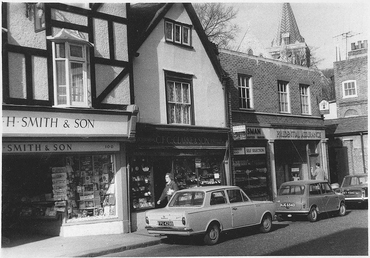 1967 The shops in this picture are W H Smith (now Subway), C F C Clarke (‘The City Jeweller’) Nicholas Kingsman (baker) and Prudential Assurance