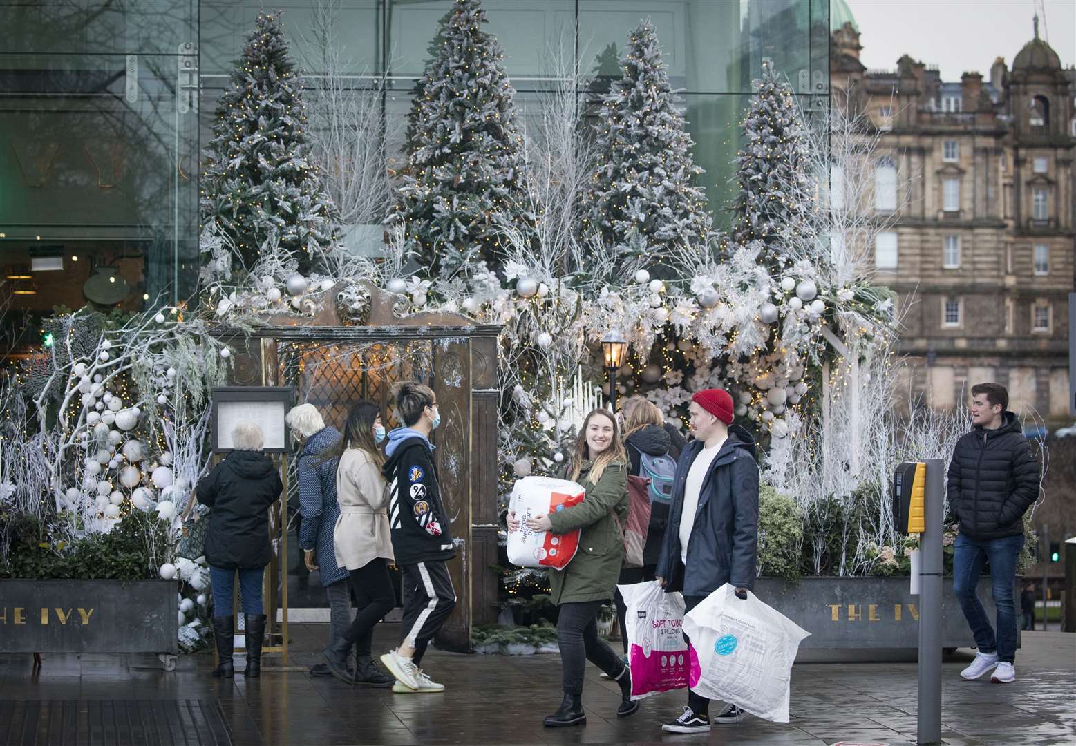 Christmas shoppers in St Andrew Square in Edinburgh (Jane Barlow/PA)