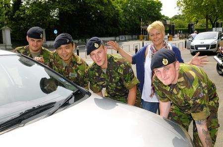 Tracey Coyd with, from left, Cpl Daniel McLaren, Sappers Binod Rai, Ben Eustace and Anthony Batchelor, who came to Tracey’s rescue.