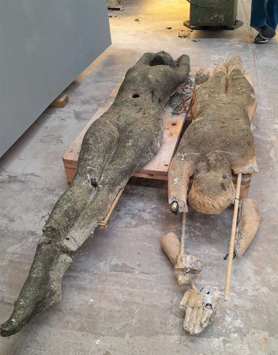 The damaged Alluvia statues recovered from the river Stour in Canterbury