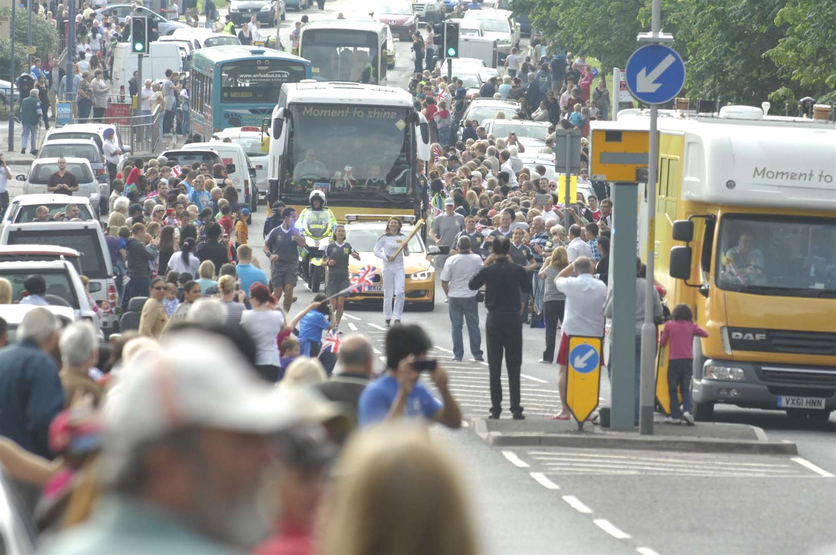 The crowds celebrate the torch passing through Gravesend, just before someone is arrested for making a grab for the flame