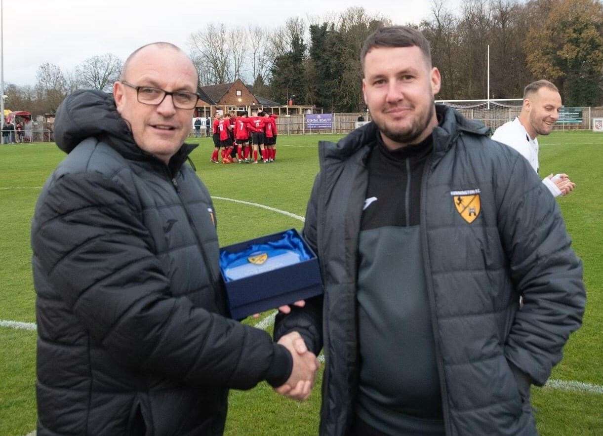 Kennington manager Dan Scorer receives a memento in recoginition of 200 games in charge Picture: Paul Davies (43481386)