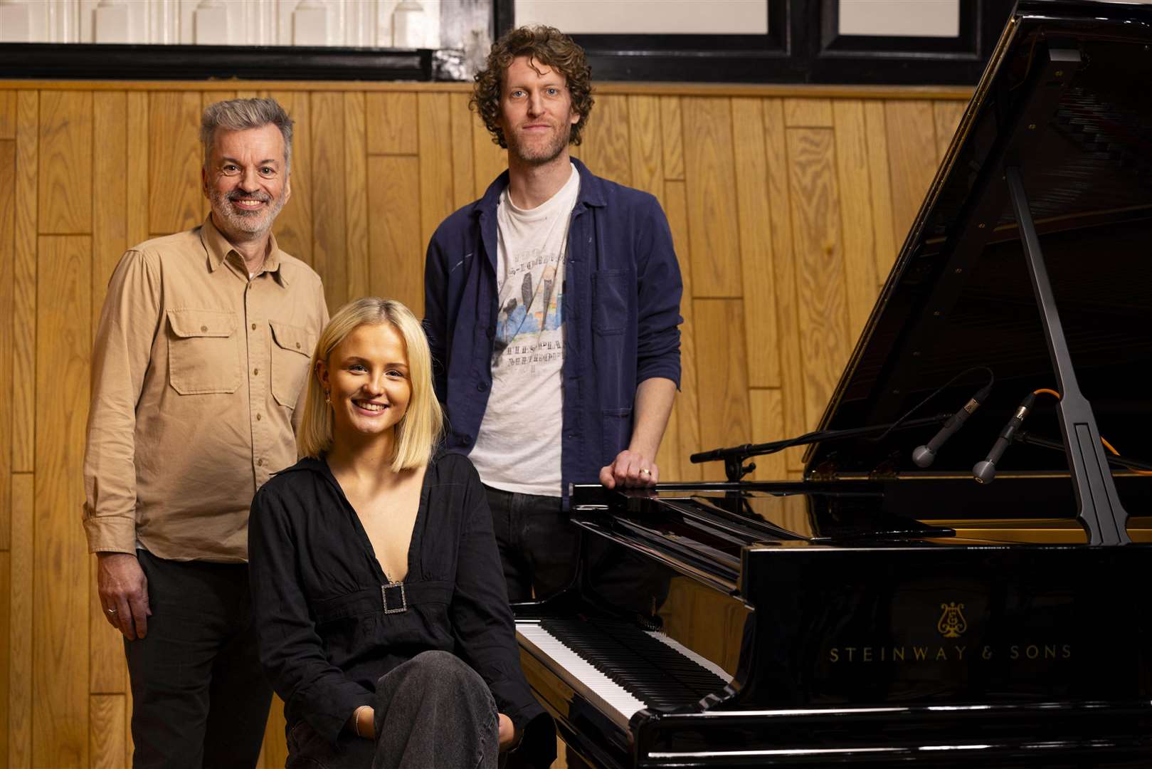 Mel Raeburn with producers Tim Bran and Ben Burrows during the recording of her version of Sonnet (David Parry/PA Media Assignments)