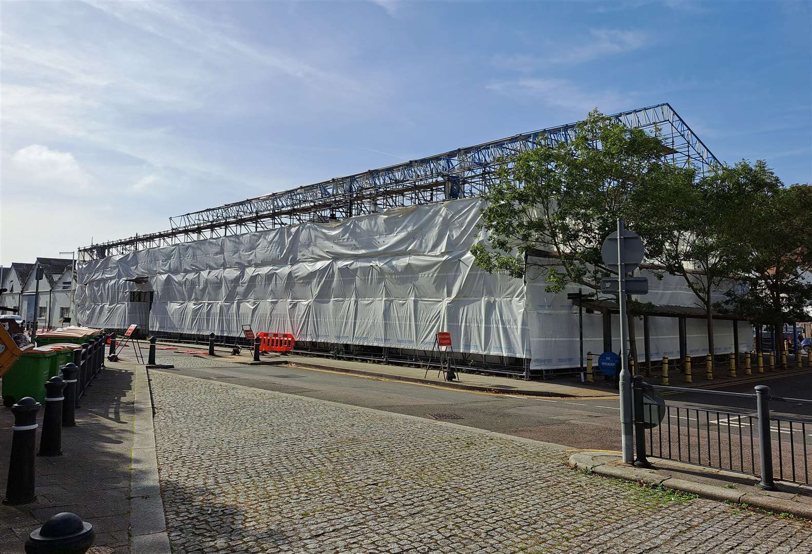 Tarpaulin now covers De Bradelei Wharf in Dover after its closure this year