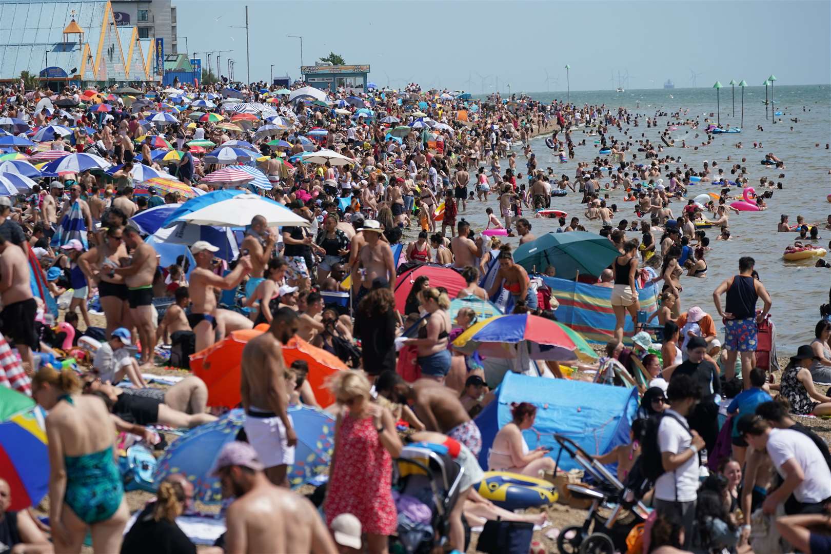 People relax on the beach at Southend-on-Sea (PA)