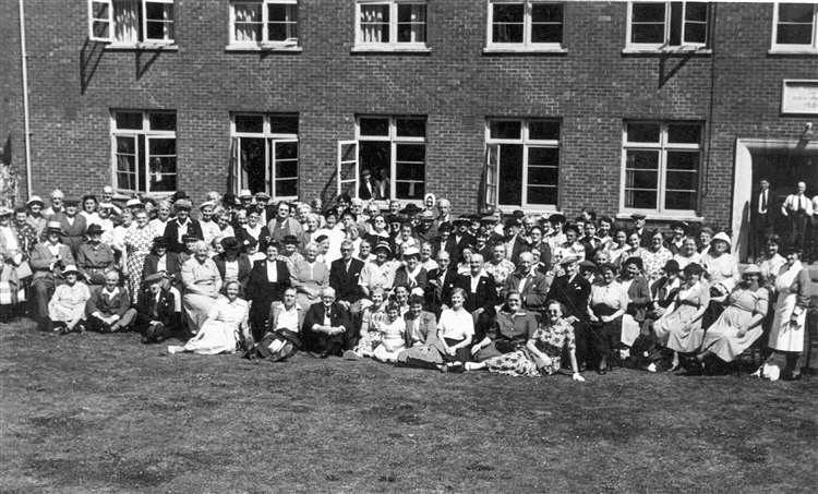 Deal Welfare Club in the early 1950s, with a crowd of pensioners waiting for the bus to arrive to take them on an outing. Picture Jim Davies