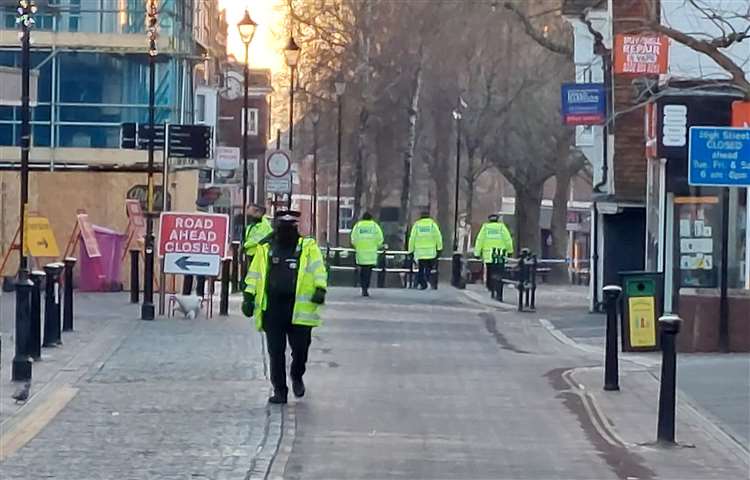 Police in Ashford high street on Friday, January 19