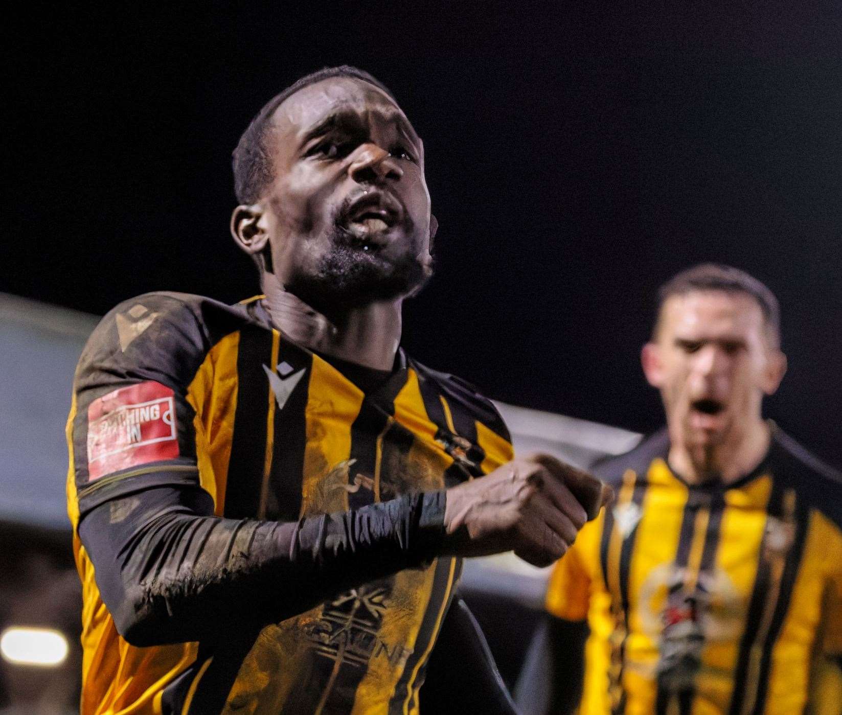 Amadou Kassarate celebrates scoring his first of his two goals in Folkestone’s 2-1 Isthmian Premier home win over Dulwich Hamlet last Tuesday. Picture: Helen Cooper