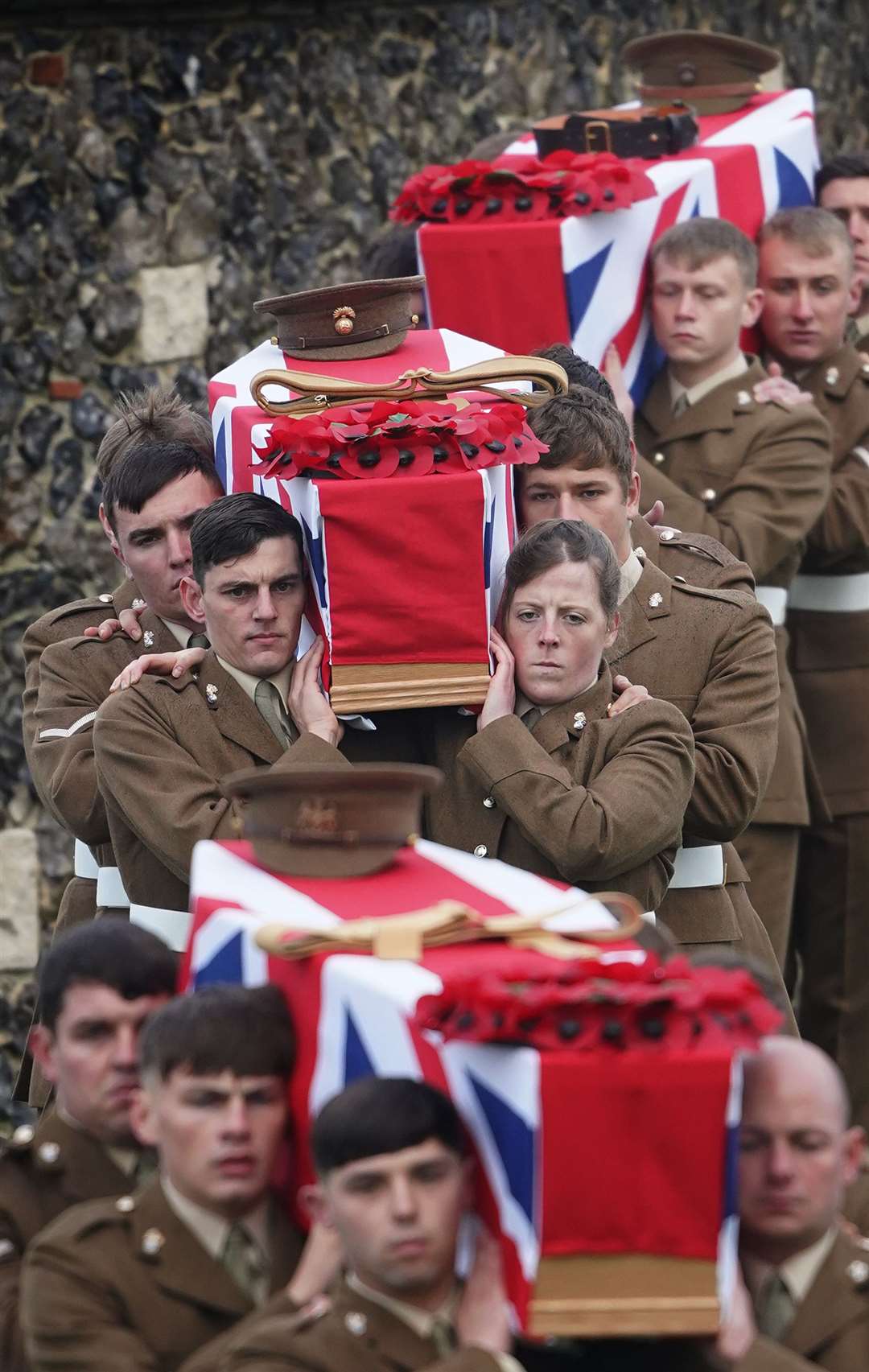 The coffins of three of the soldiers arrive to be laid to rest (Gareth Fuller/PA)