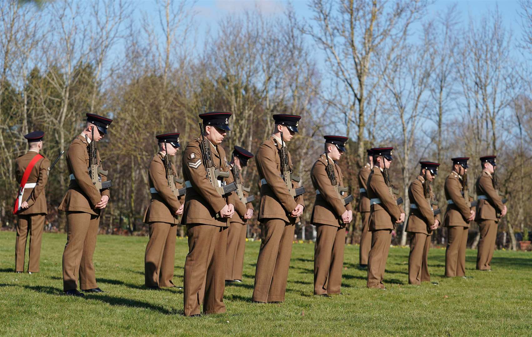 Members of the Armed Forces pay respects at the funeral (Joe Giddens/PA)