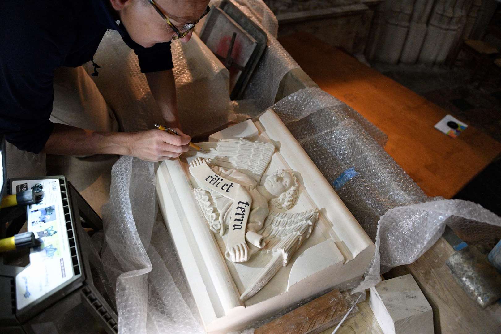 Artist Nina Bilbey at work on the carvings in Canterbury Cathedral