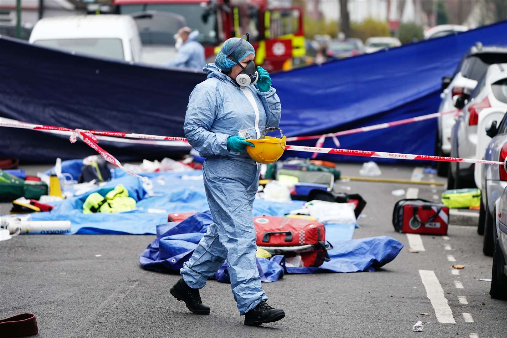 Forensic investigators at the scene in Collingwood Road, Sutton (Aaron Chown/PA)