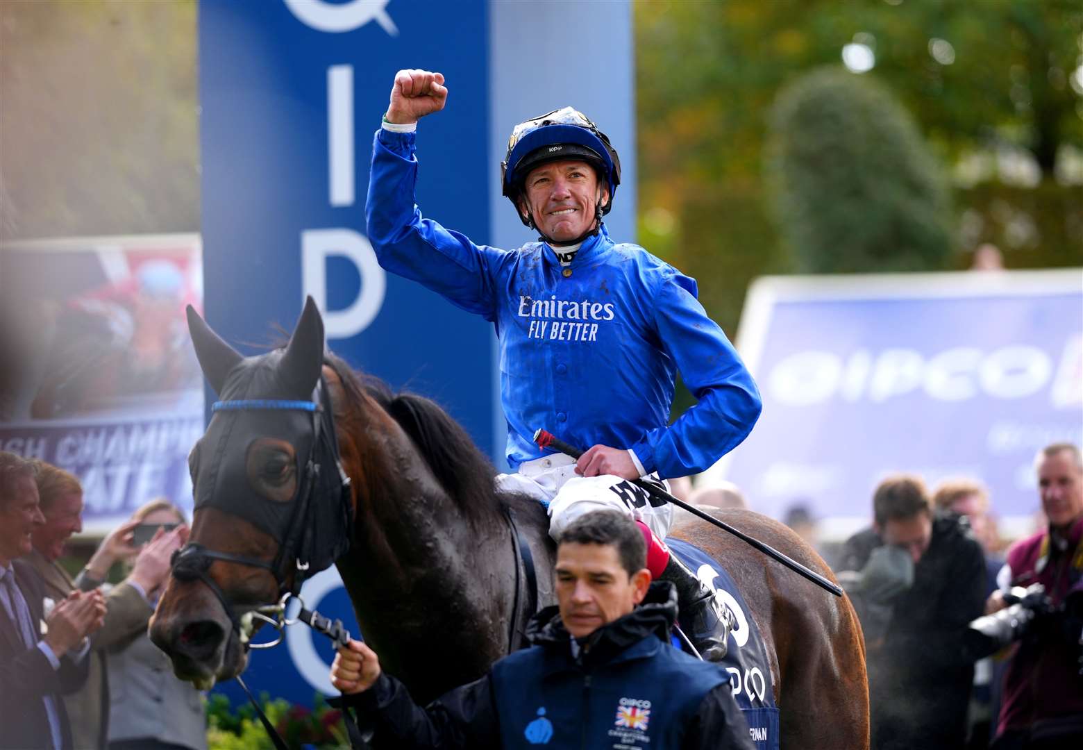 Frankie Dettori celebrates on Trawlerman after winning the Qipco British Champions Long Distance Cup (John Walton/PA)