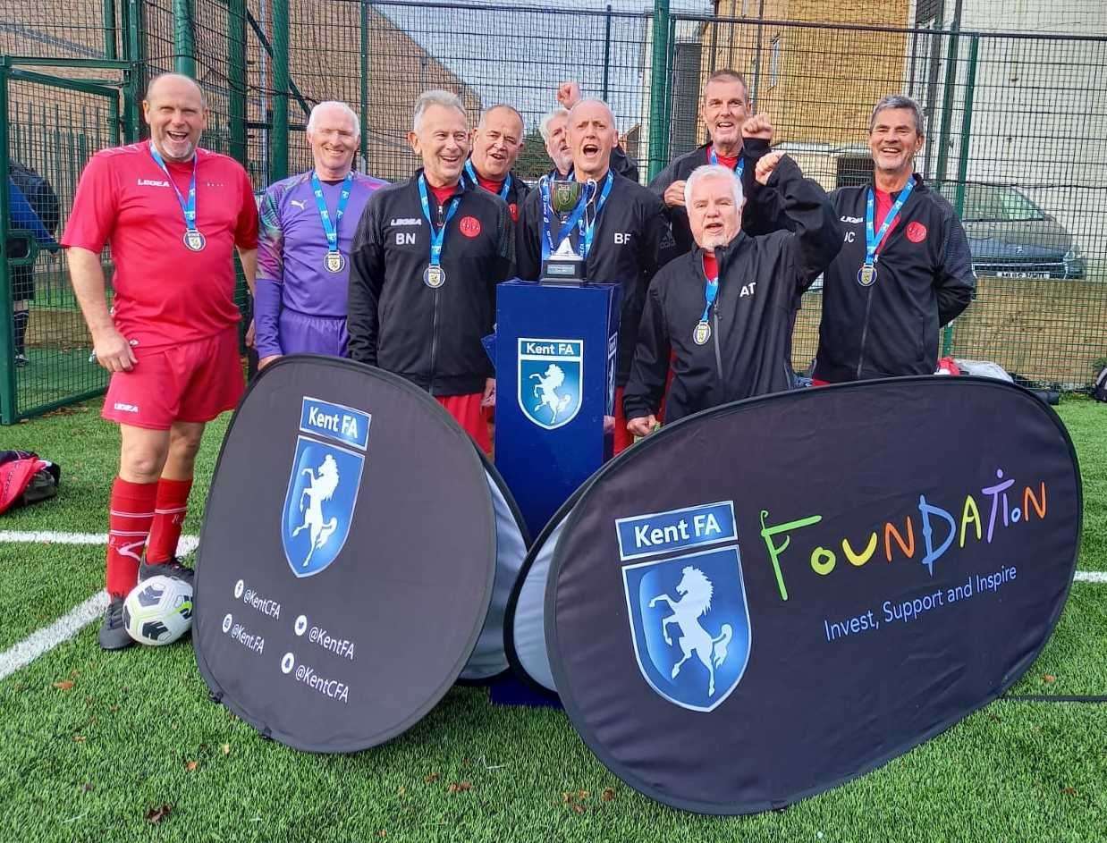 The victorious Woodnesborough A team with their trophy