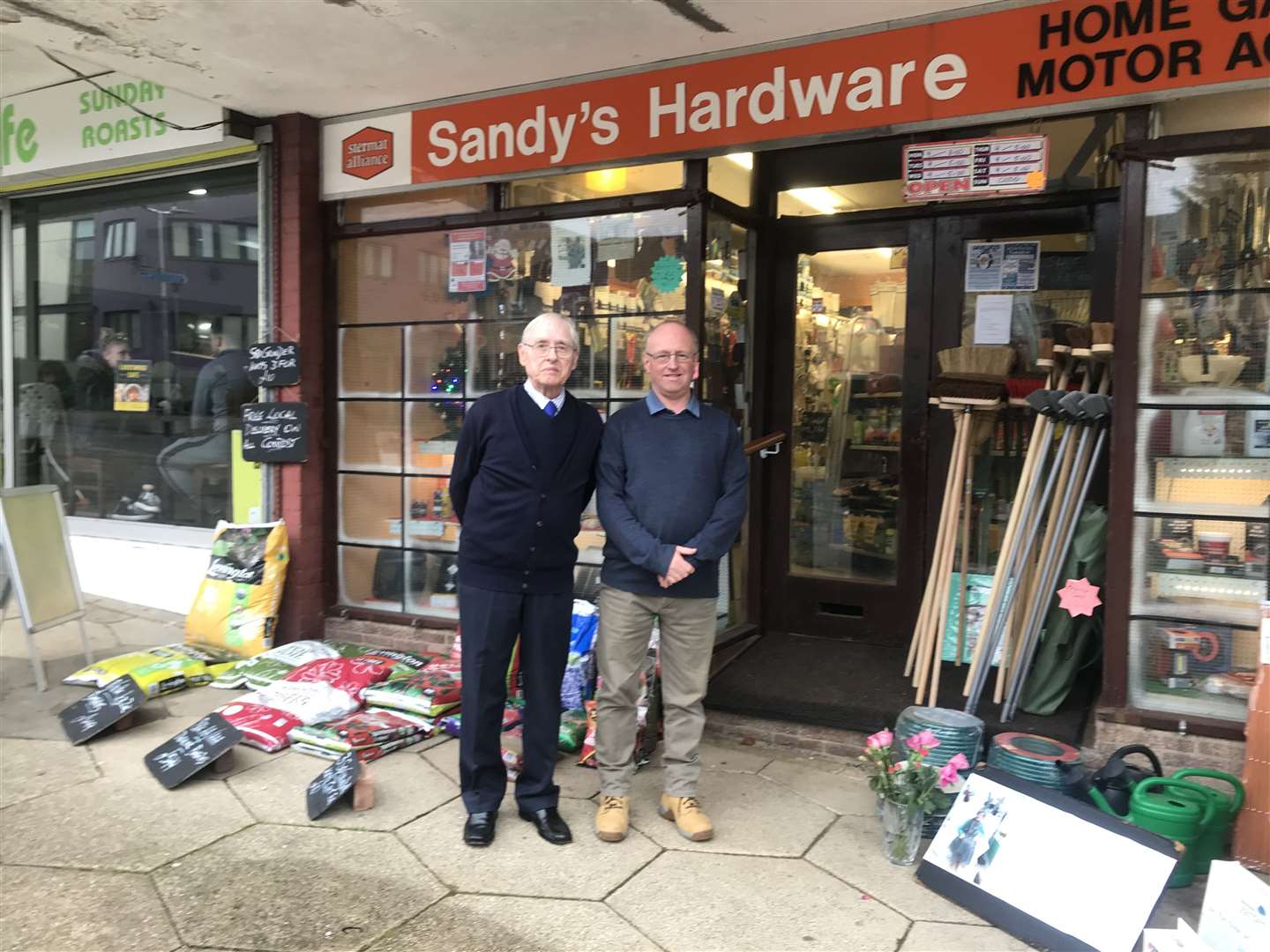 Dad Terry with Andy Saunders outside Sandy's Hardware