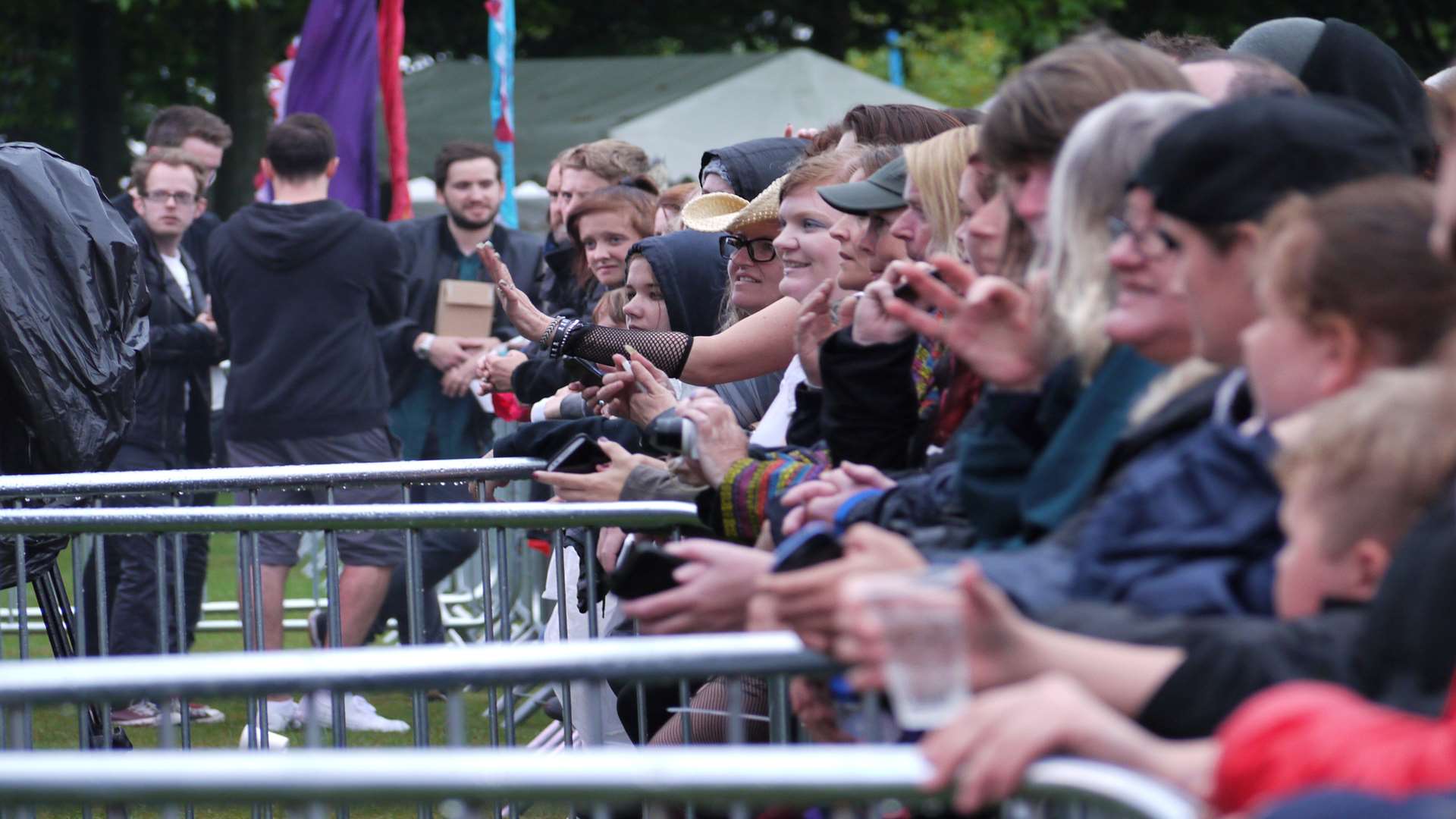 The crowd awaits the arrival of Adam Ant.