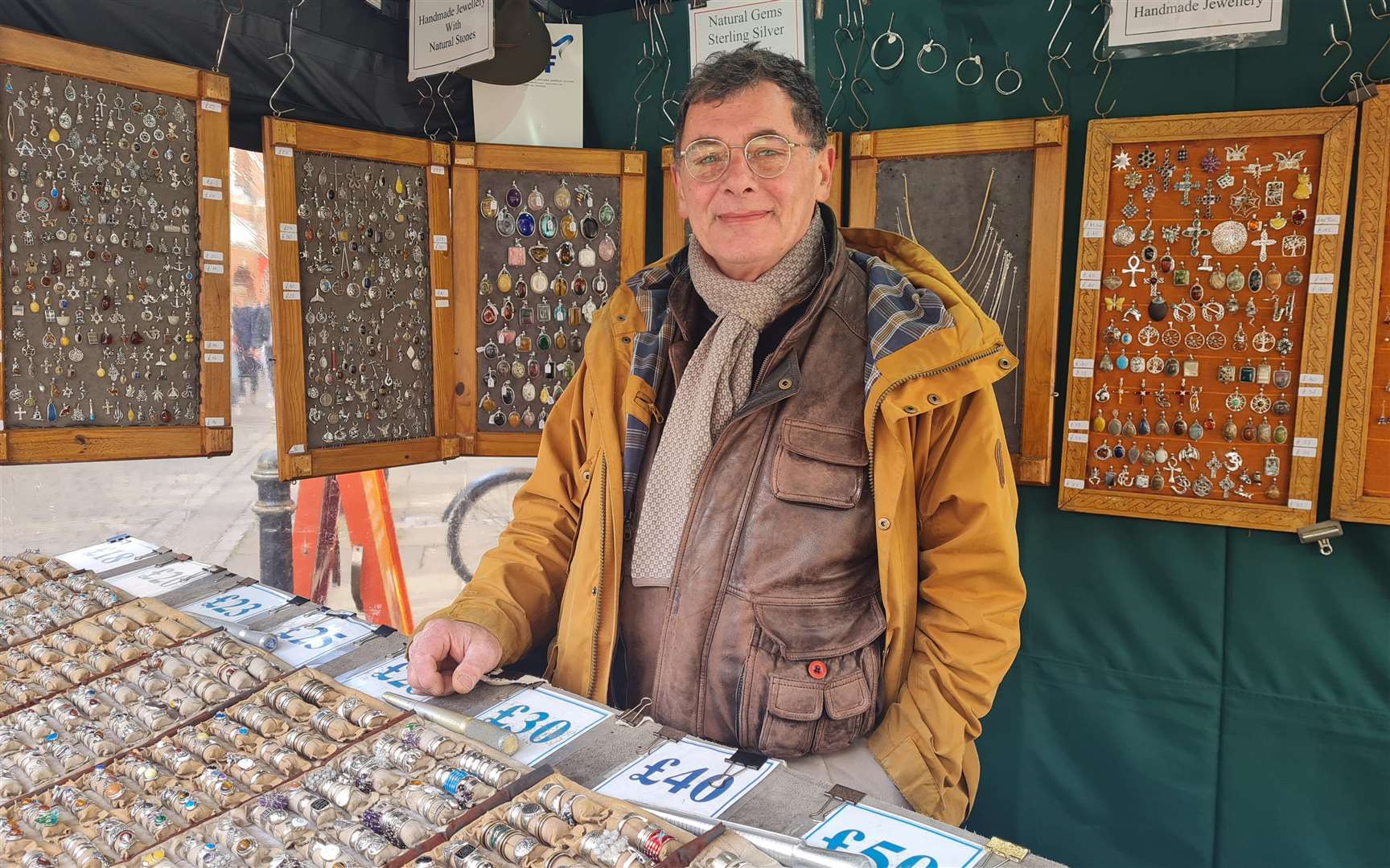 Jewellery maker Attilio Termine at his street trading stall in Canterbury