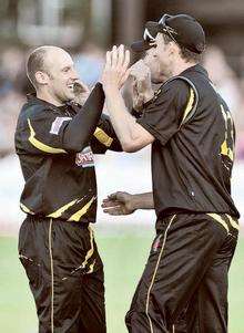 James Tredwell is congratulated on one of his three wickets