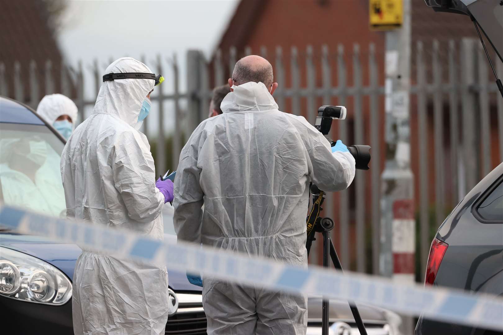 Scenes of crime officers from the PSNI at the scene following a shooting at the clubhouse of Donegal Celtic Football Club, in west Belfast. Picture date: Sunday October 2, 2022.