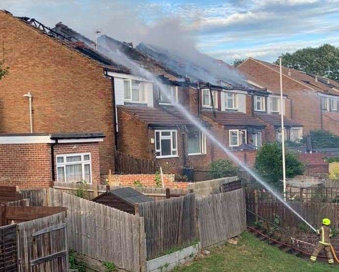 Firefighters tackling the flames in Rose Street, Northfleet. Picture: Alex Helen Reid