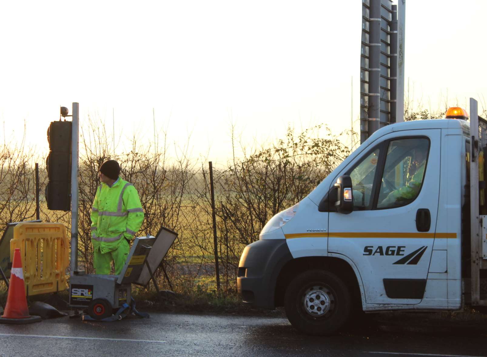 Temporary traffic lights were under manual control today