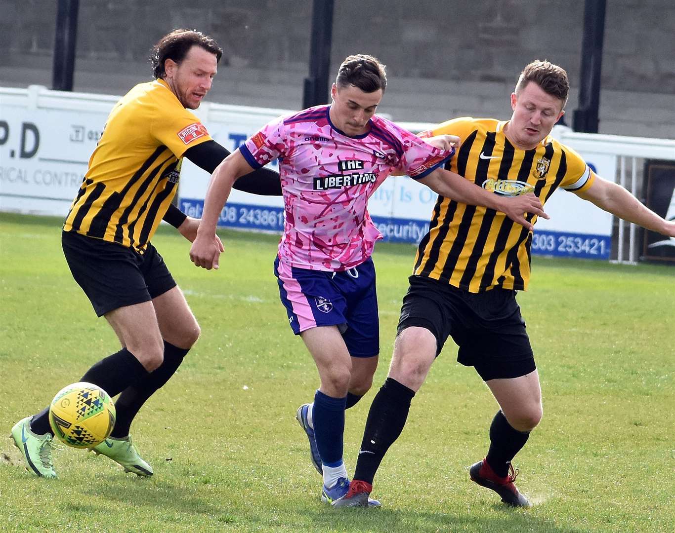 Invicta duo Callum Davies and Johnson crowd out a Gate player. Picture: Randolph File