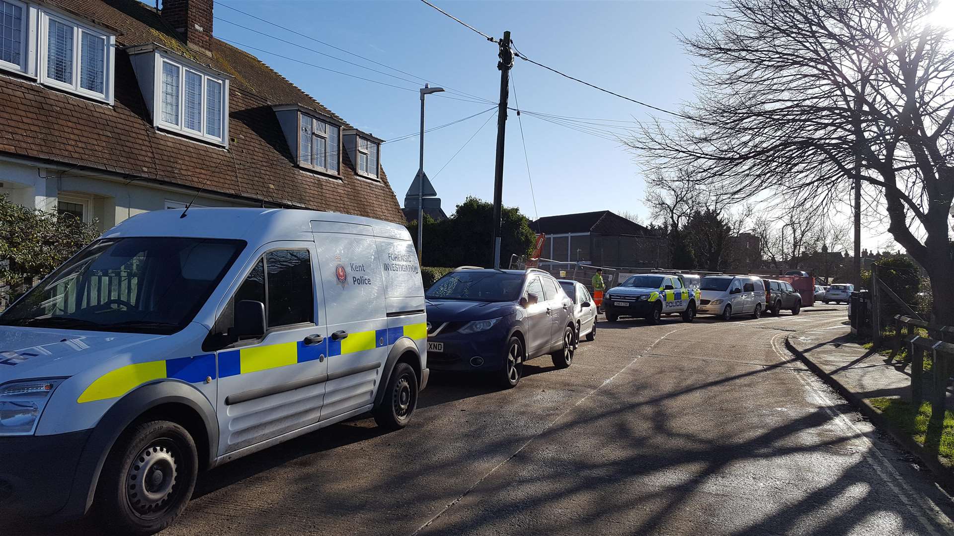 Several police vans at the scene (6700497)