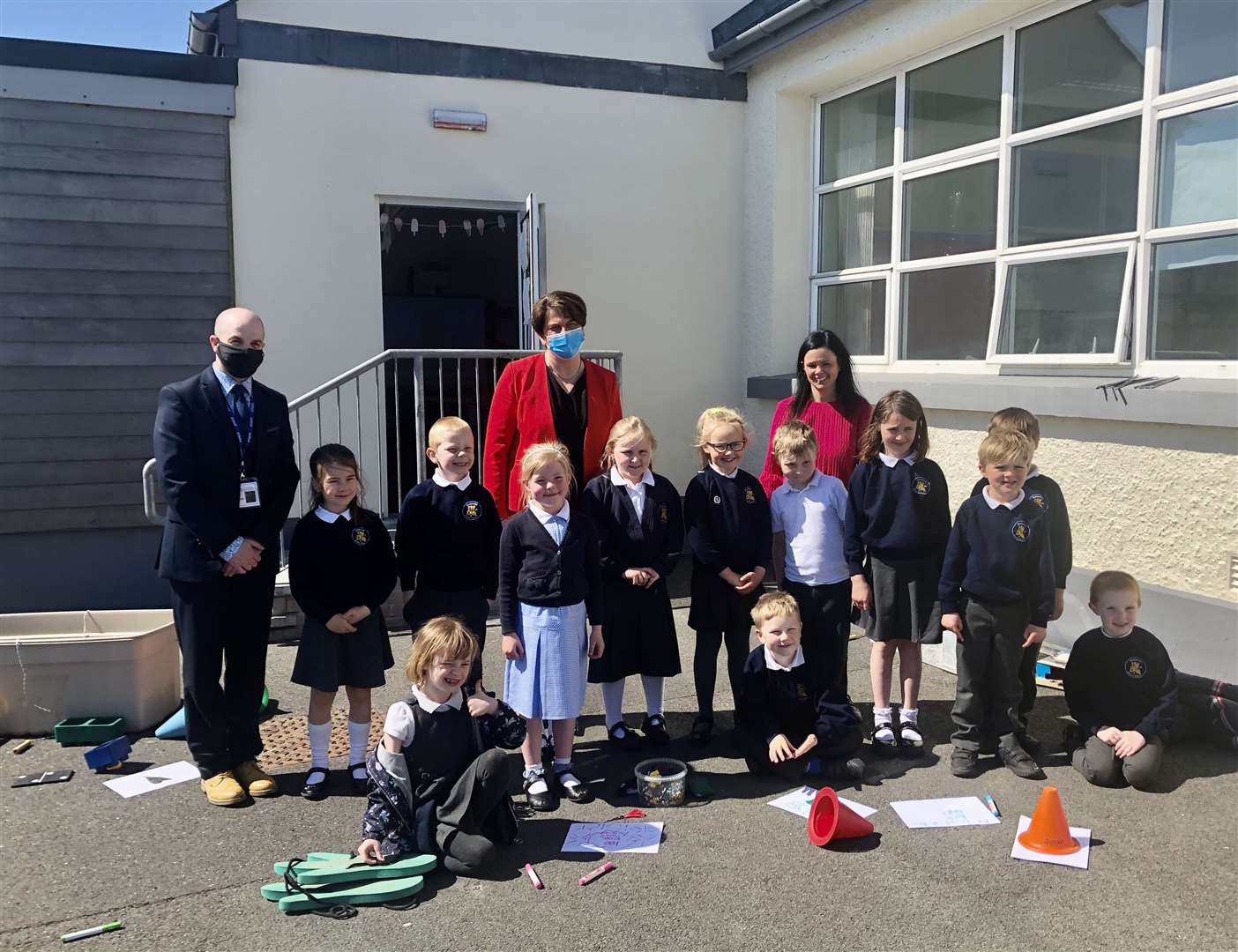 Arlene Foster with pupils and staff during a visit to Kirkistown Primary School in Co Down (David Young/PA)