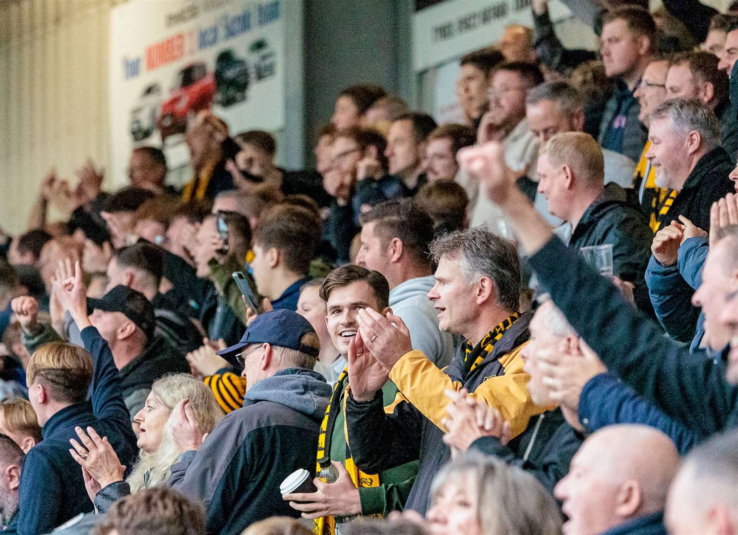 Maidstone fans celebrate. Picture: Helen Cooper