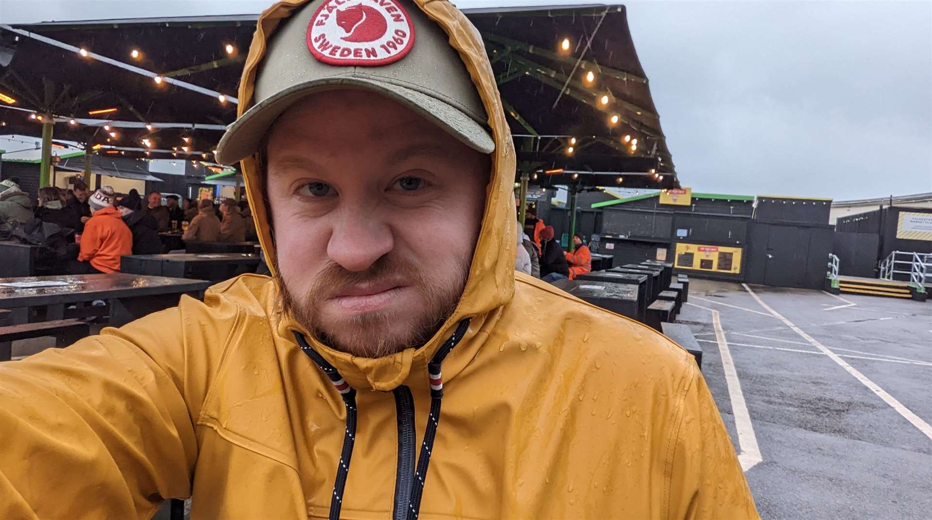 Reporter Rhys Griffiths braves the wind and rain at the Folkestone Harbour Arm