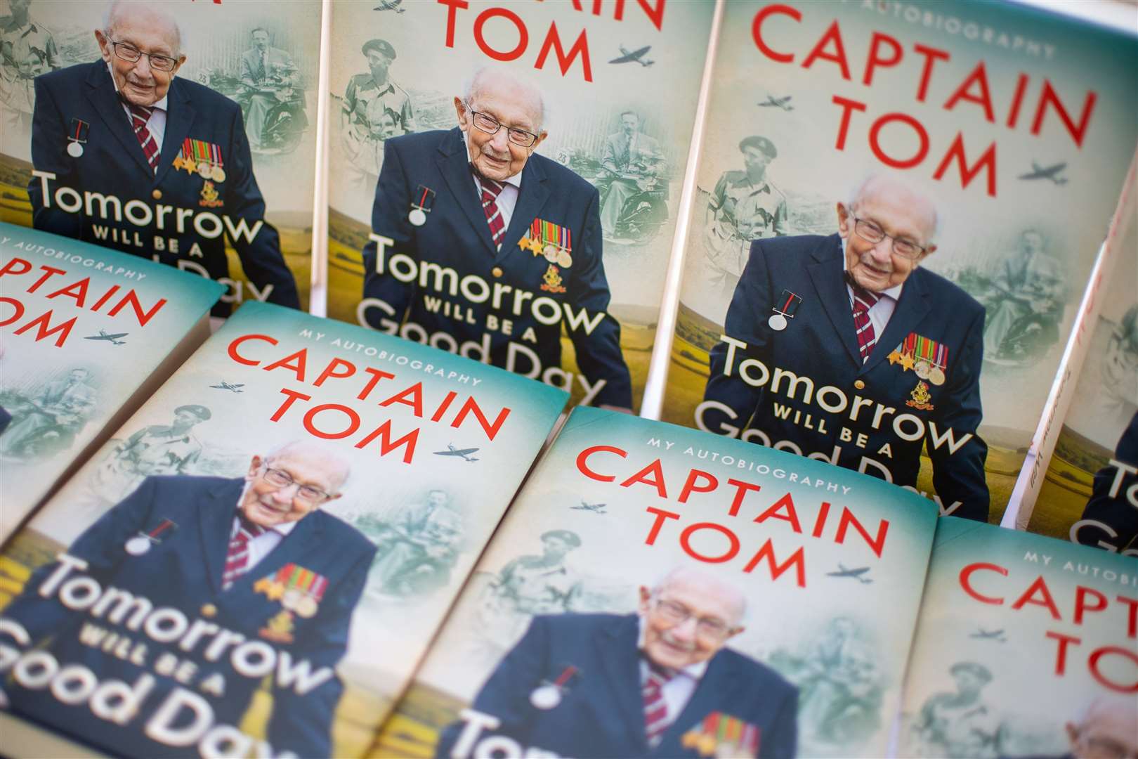 Copies of Captain Sir Tom Moore’s autobiography Tomorrow Will Be A Good Day (Joe Giddens/PA)