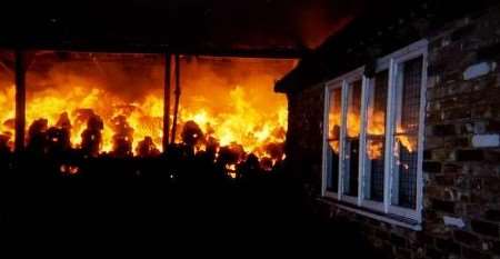 The scene at the height of the fire. Picture courtesy JULIAN HARTLEY/ TEYNHAM FIRE STATION.