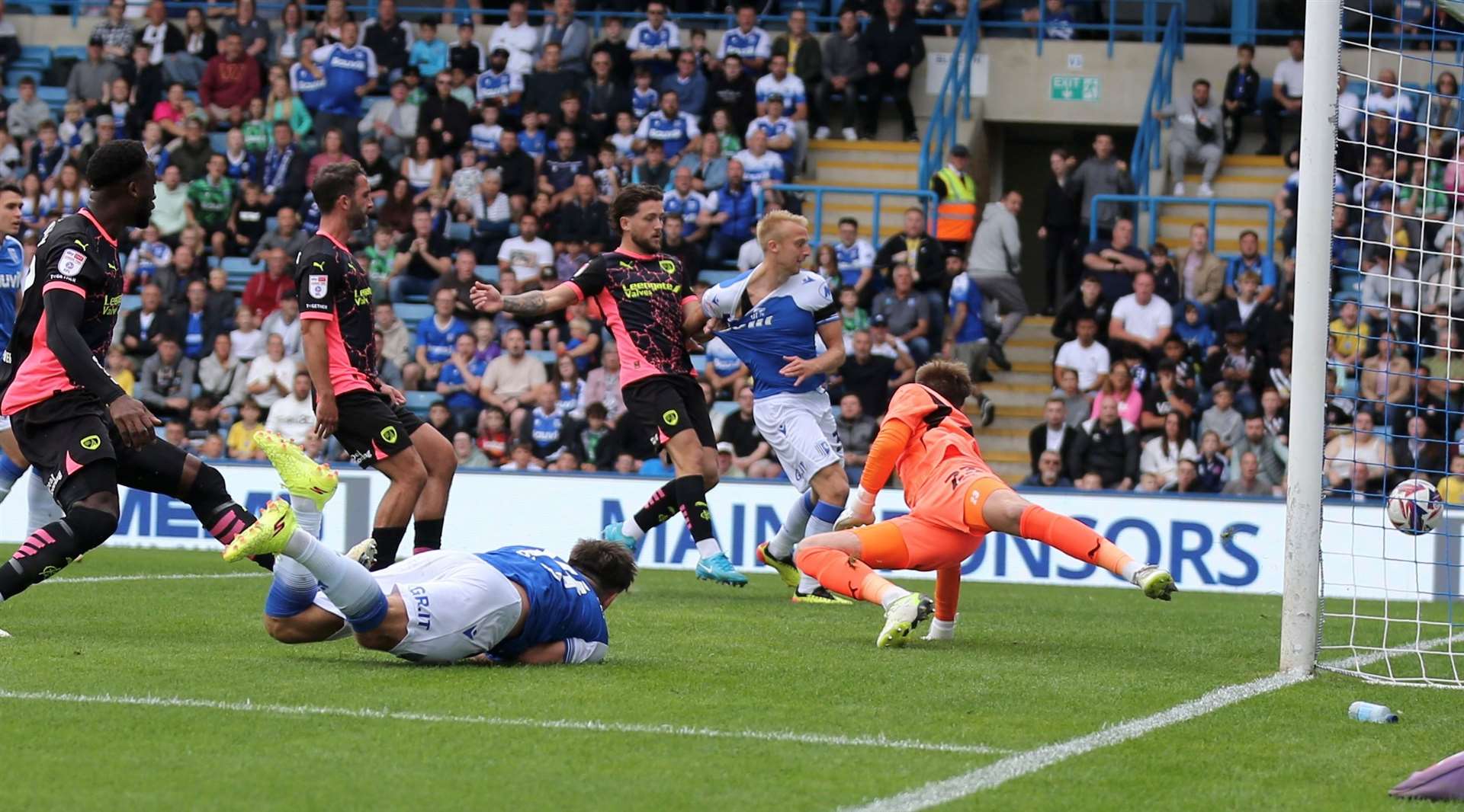 Robbie McKenzie heads in the opener for Gillingham against Chesterfield Picture: @Julian_KPI