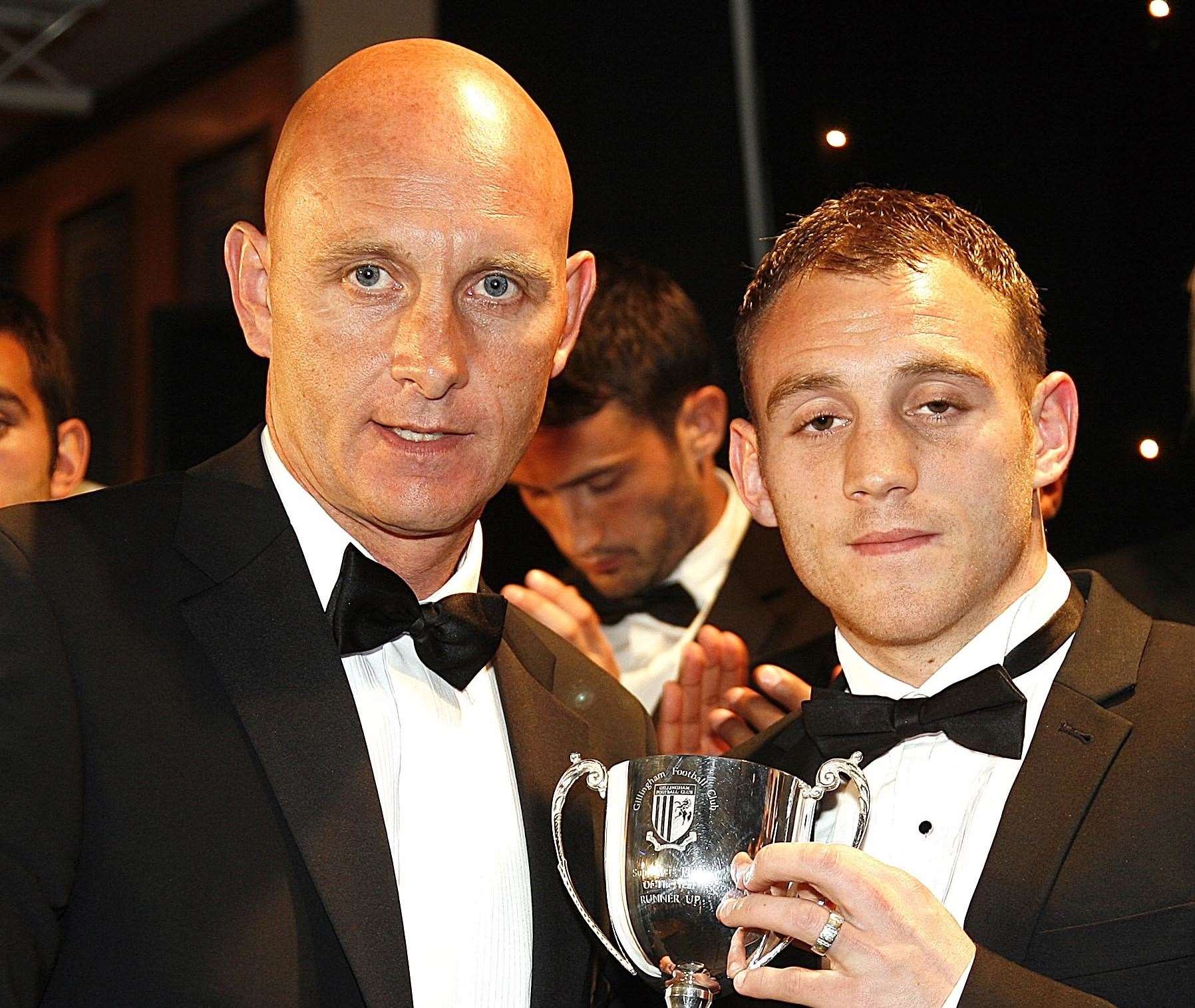 Former boss Mark Stimson with Barry Fuller and his runner-up award for the player-of-the-year in 2010 Picture: Keith Slater