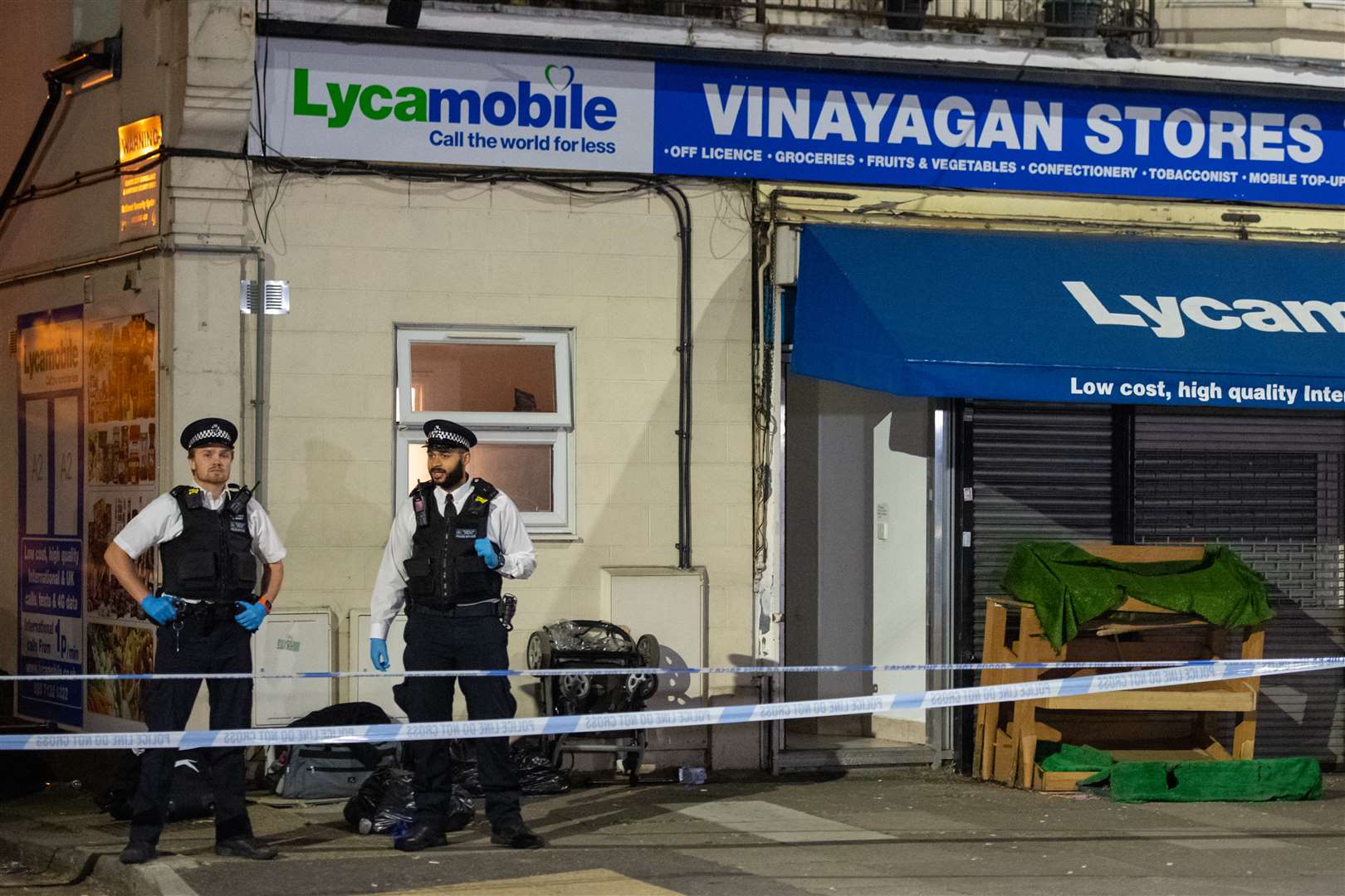 Police at the scene in Aldborough Road North, Ilford (Dominic Lipinski/PA)