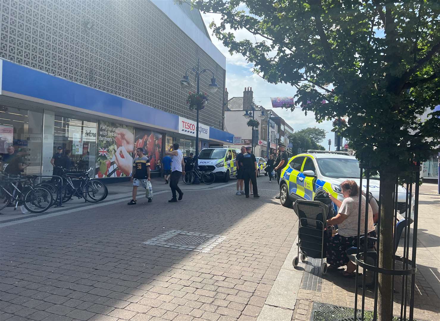 Police in New Road, Gravesend, outside Tesco