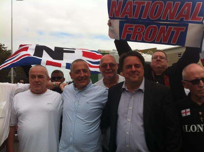 Former British National Party chairman Nick Griffin with supporters before the start of the march