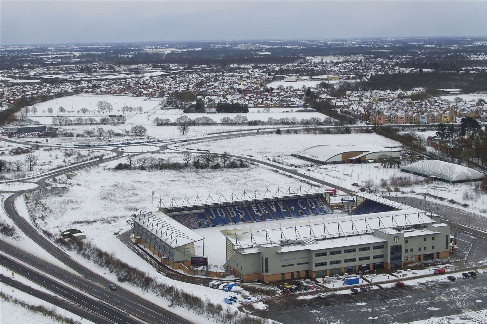 Snowy conditions at Colchester United football ground (Steve Parsons/PA)