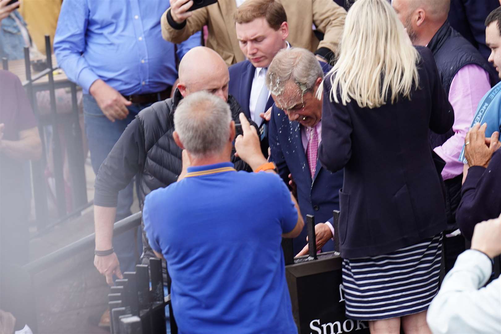 Nigel Farage had a drink thrown over him after launching his general election campaign in Clacton (James Manning/PA)