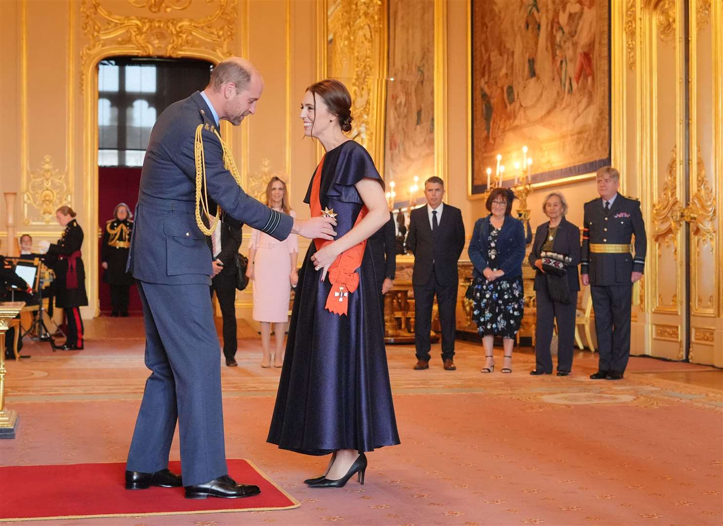 Dame Jacinda Ardern was honoured by the Prince of Wales at Windsor Castle (Jonathan Brady/PA)