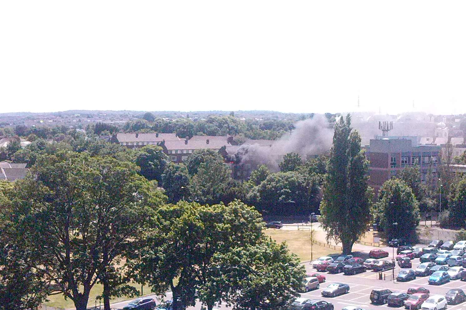 Smoke billowing from the roof of flats in Park Place. Picture: Nick Smith