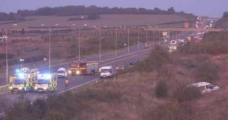 The minibus, right of picture, after it left the road. Picture: CHRIS DAVEY